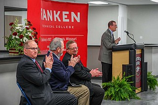 Julie Smith/News Tribune
Don Pohl, right, president of Ranken Technical College, speaks Friday during a ribbon-cutting ceremony at its new location in Ashland. Seated are, from left, Chad Eggen of the US Department of Economic Development; Bill Lloyd, the campaign general chair of Investing in Tomorrow's Workforce; and Tim Roth, superintendent of Southern Boone School District.